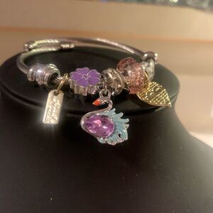 New, never worn. Silver Charm Bracelet with White Accents